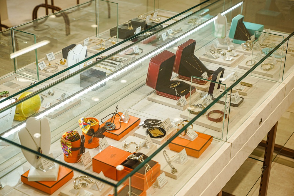 Accessories and jewelry displayed inside a store showcase