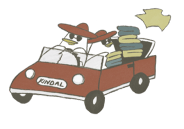 洋服をたくさん積んだ車に乗るペンギンのイラスト